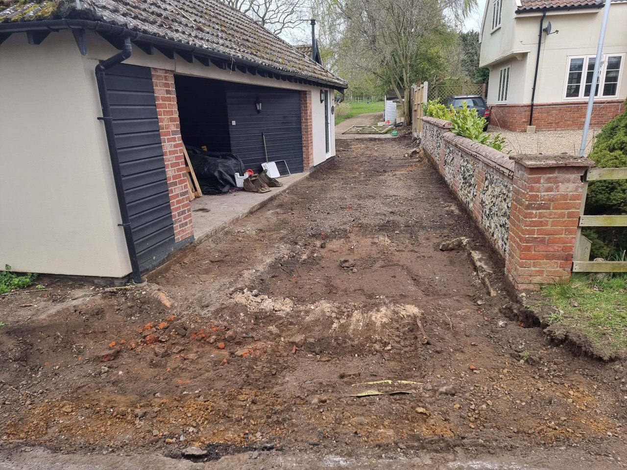 This is a tarmac driveway that is in the process of being dug out and installed by Witchford Driveways